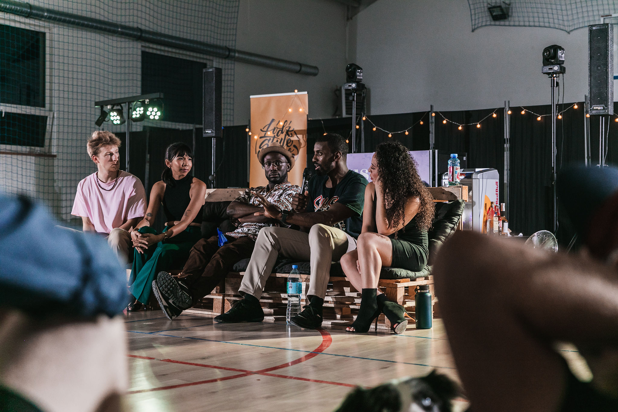 Shay Dixon speaking on a panel at Hustle Up